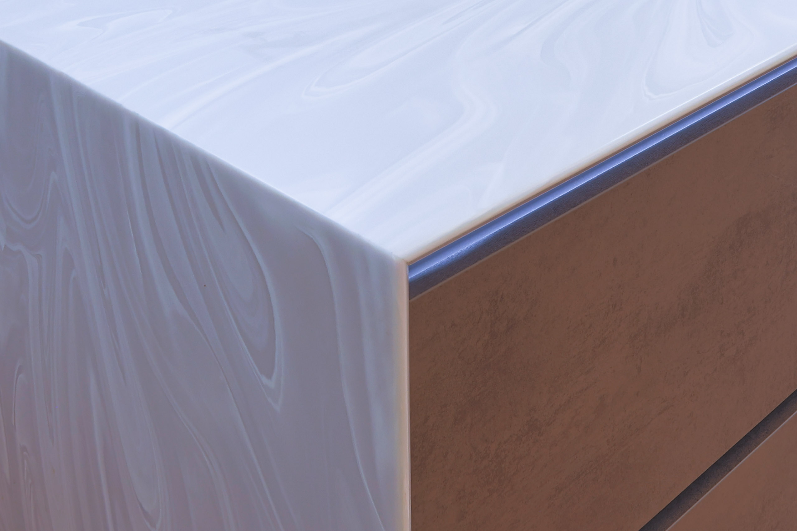 modern handleless concrete kitchen with corian worktops in wilmslow cheshire 