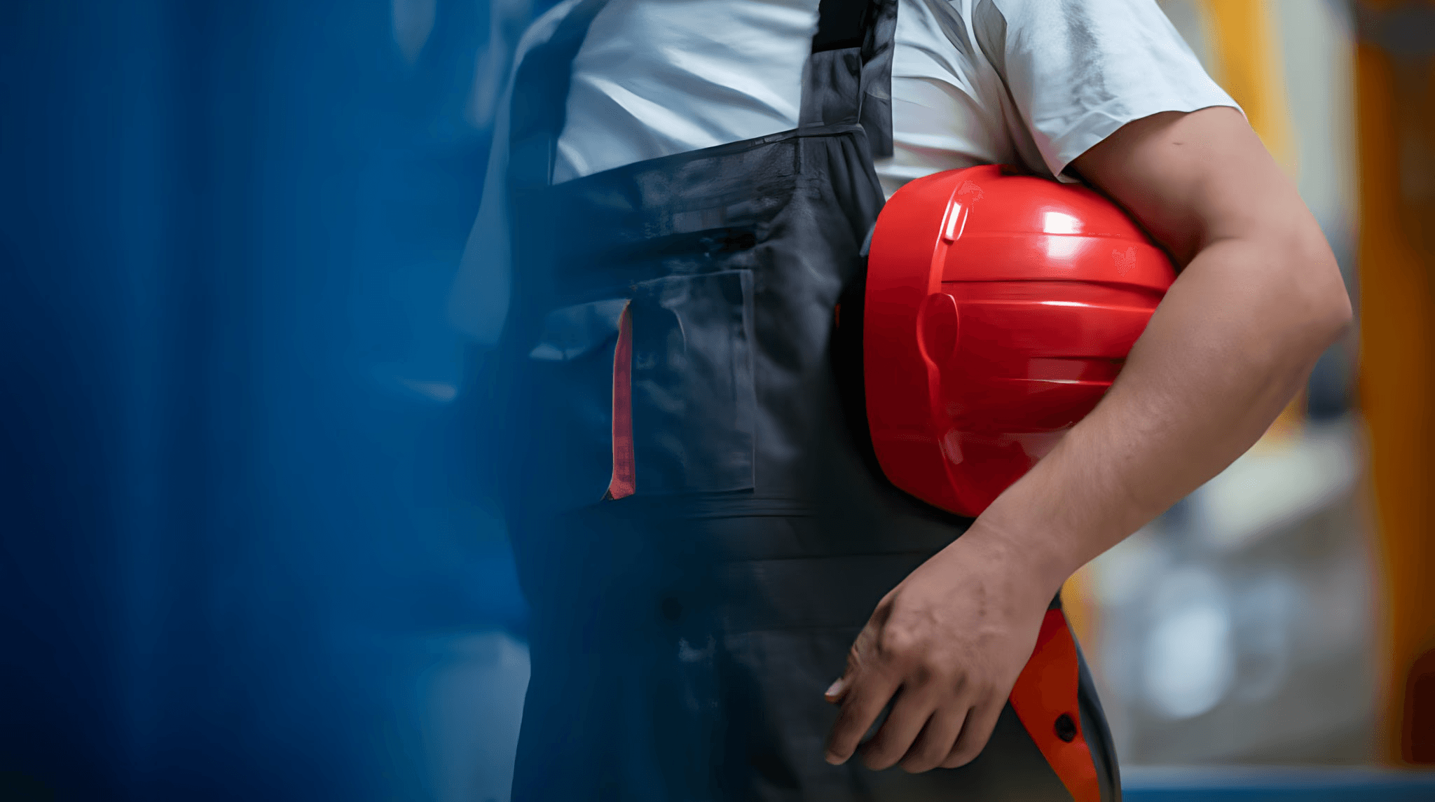 red hard hat on pavement\