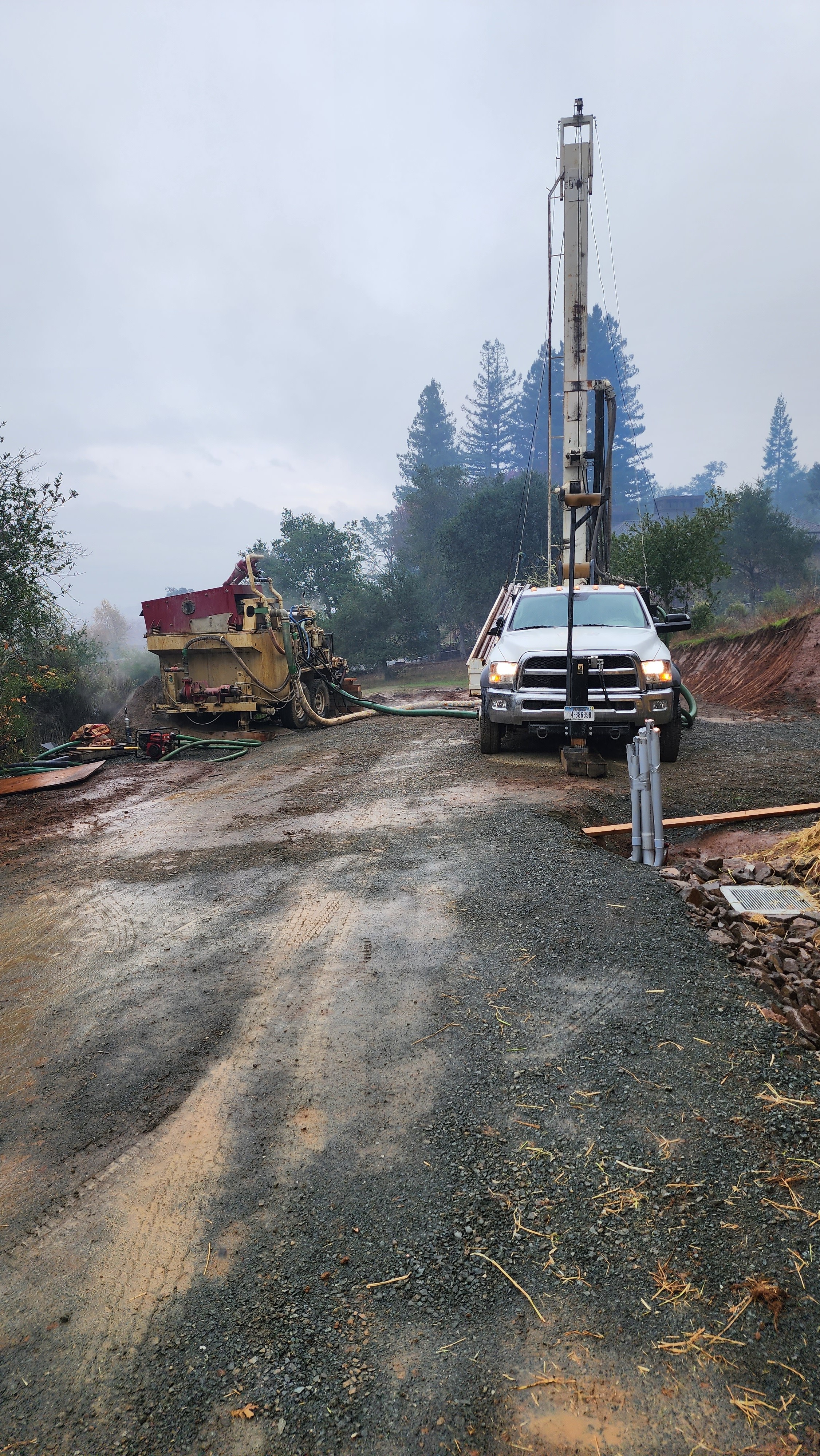 Well drilling rig on site in the Napa Valley hills