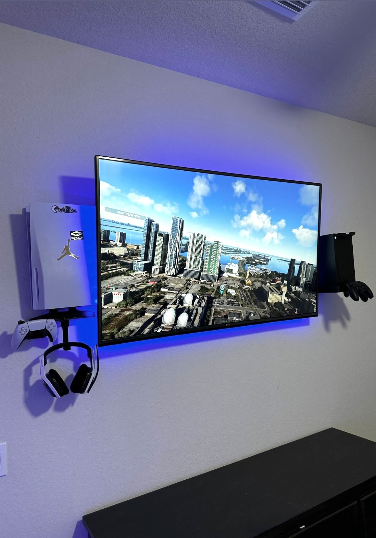 50 inch TV Mounted with game console