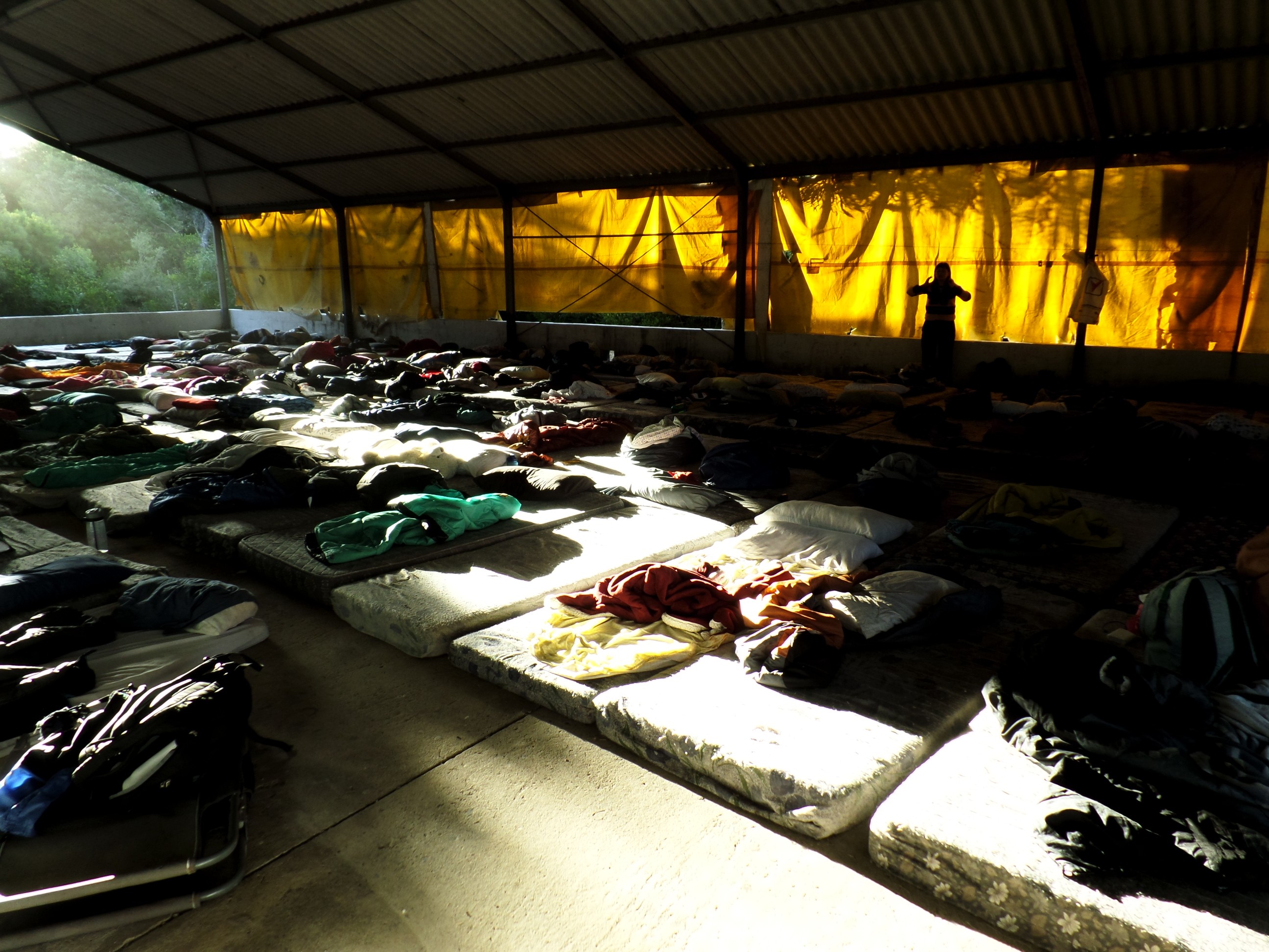 A group of people sitting around a living room