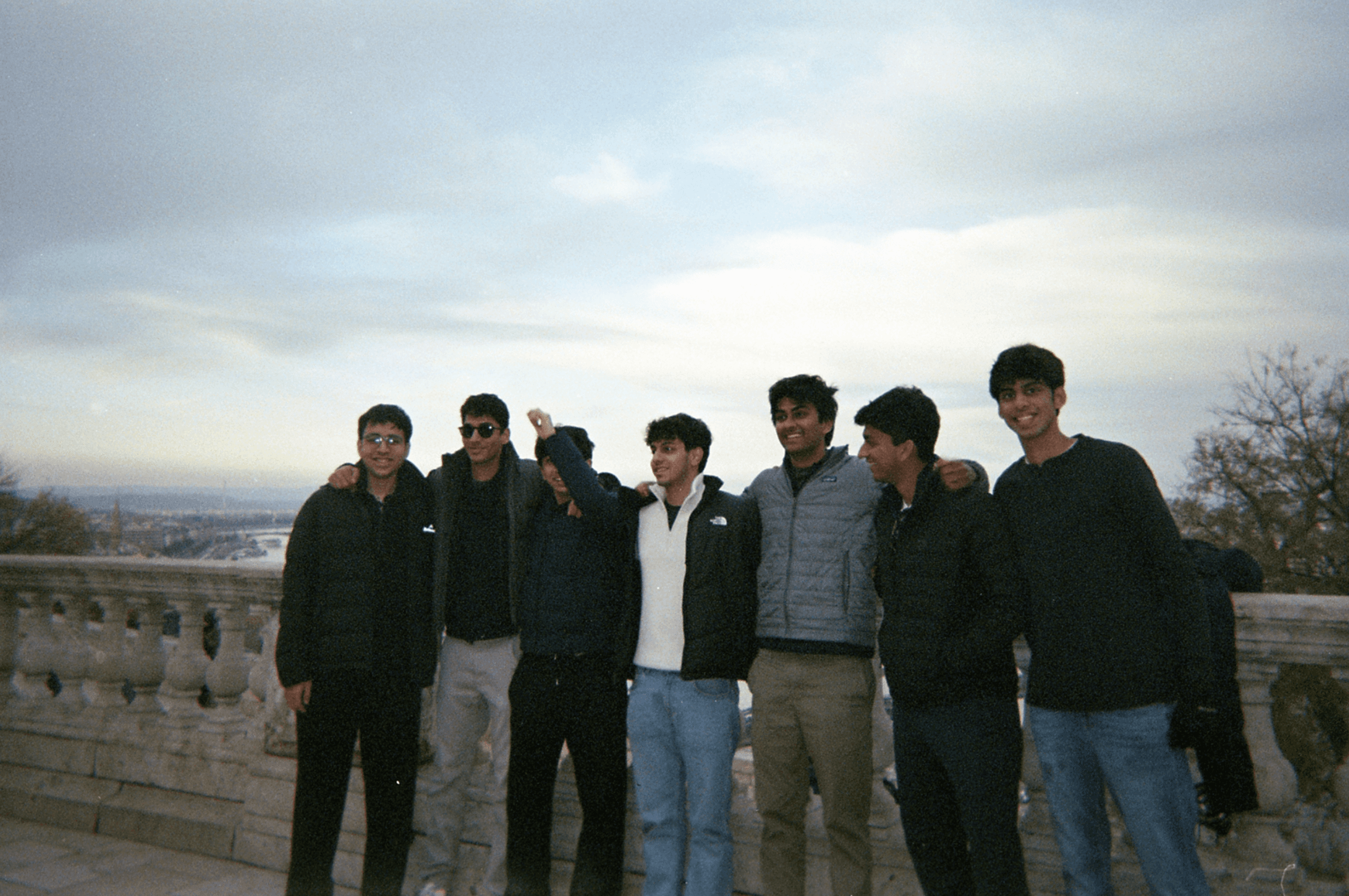 man filming on beach