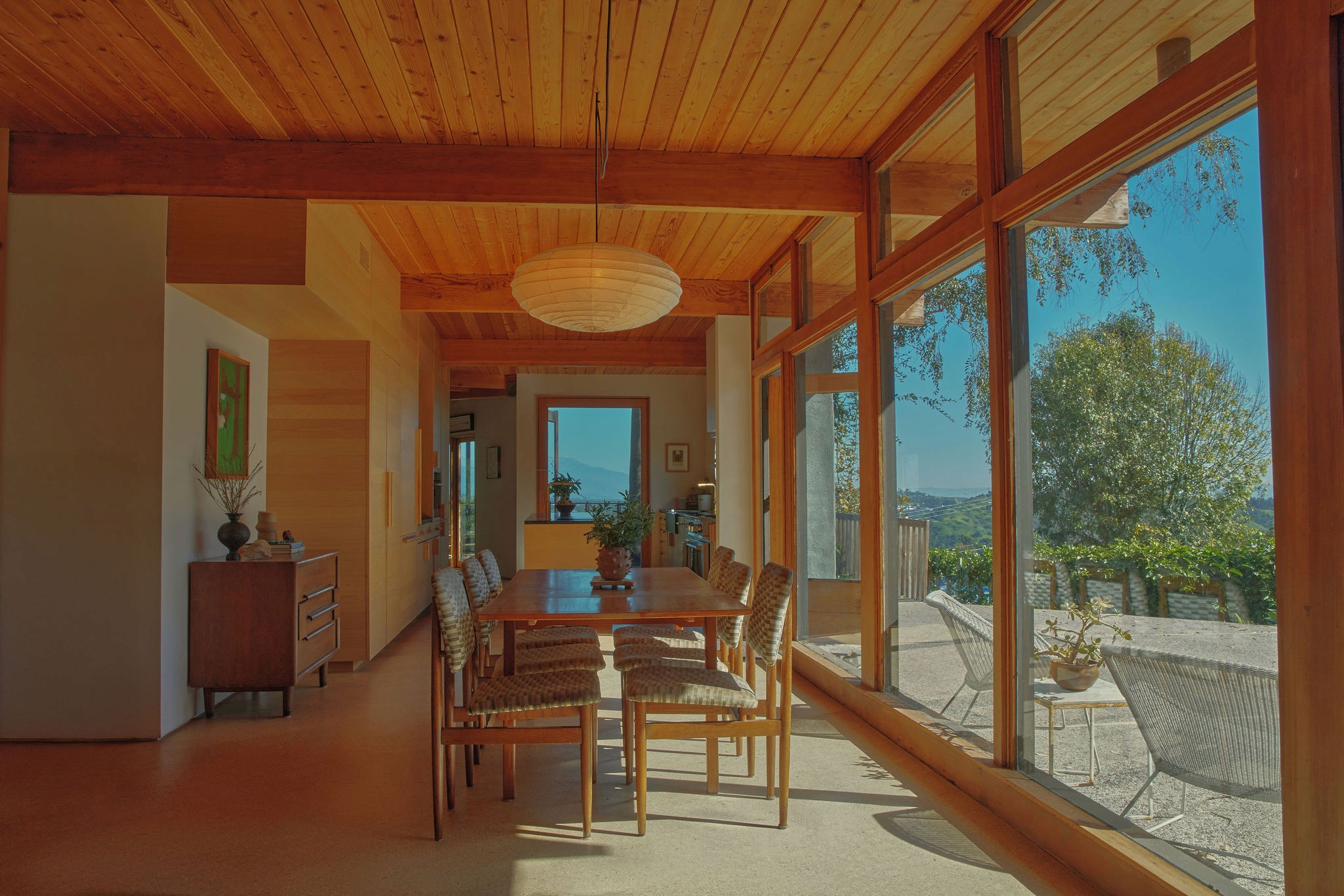 American flag flying against a cloudy sky