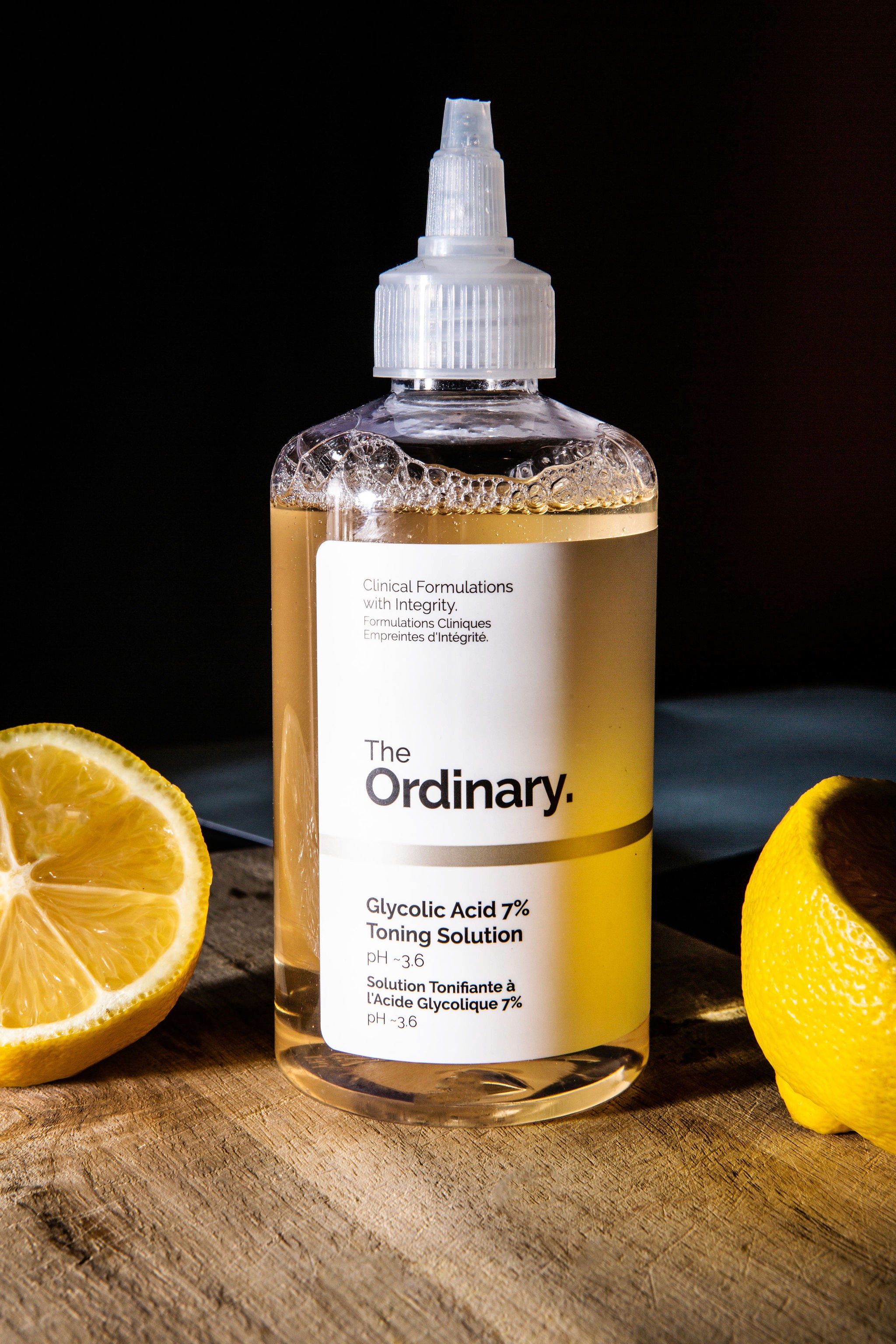 Woman with red hair covering mouth with hair