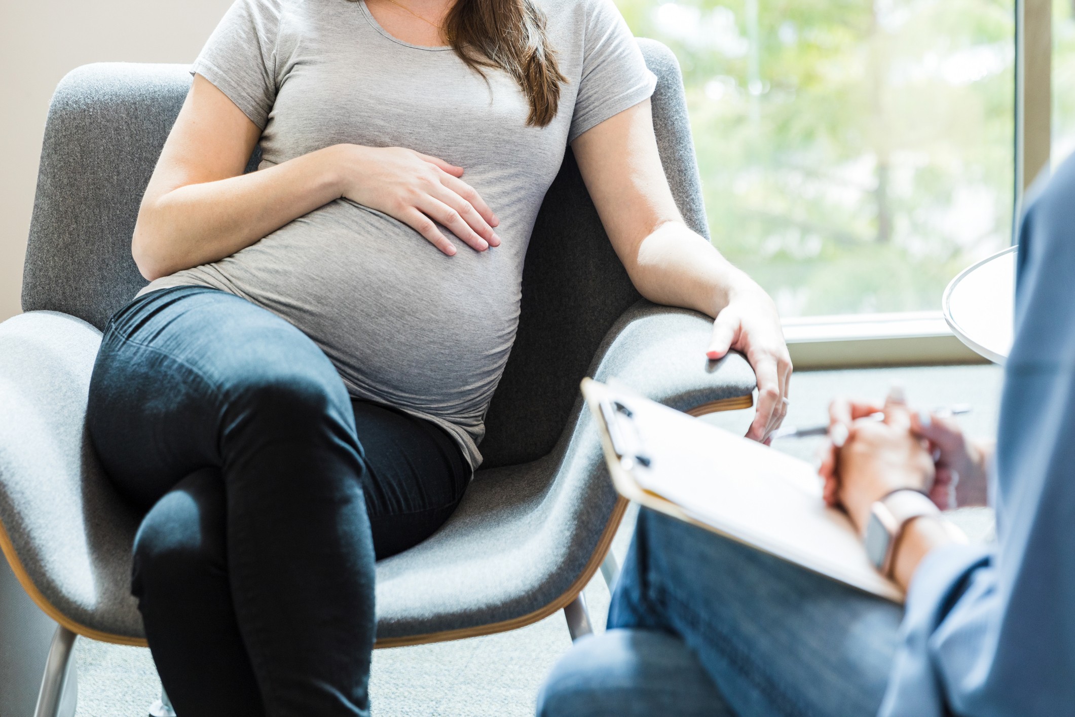 A pregnant woman during a prenatal therapy session.