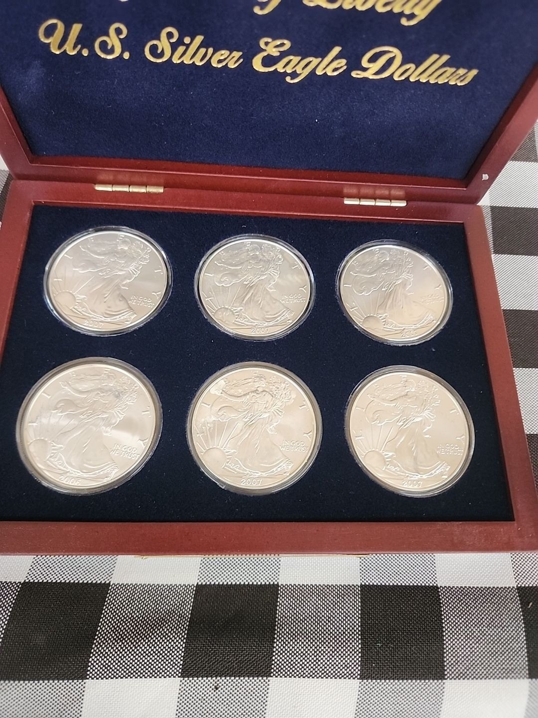 Lot 43: (6) US Silver Eagle Dollars, Symbols of Liberty Collection