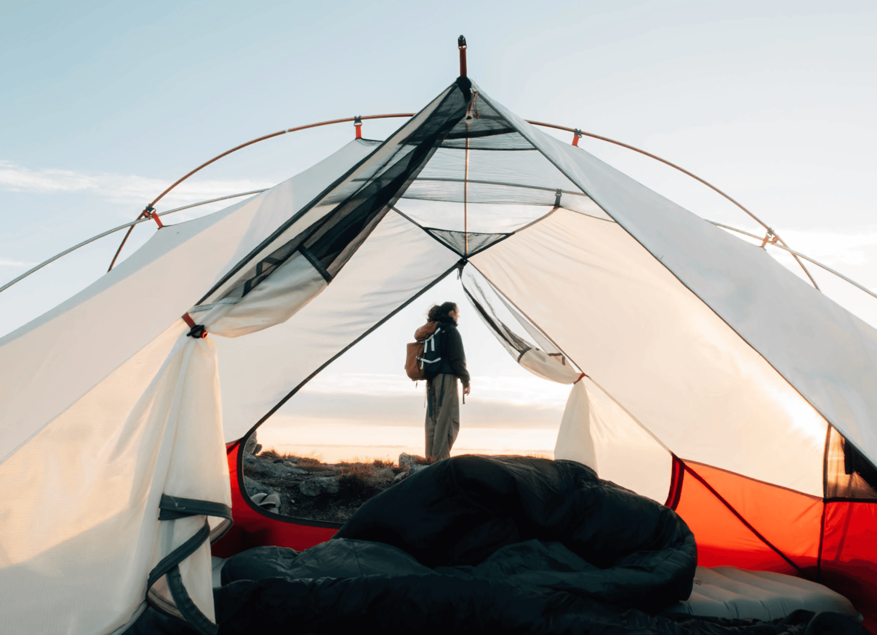 Screenshot of moodcase Visual Asset Management showing an outdoor camping photo by Jon Guler. The metadata panel displays location information for Fjordgård, Norway, along with photographer details, keywords, AI tags, copyright data, and searchable image attributes.