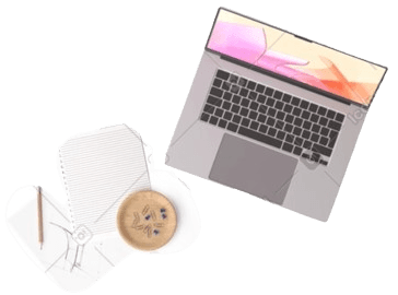 Mockup of a laptop next to papers 