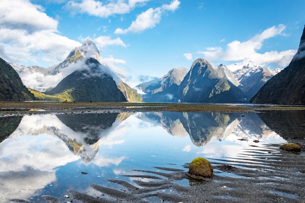 Mitre Peak reflected in still water at Milford Sound