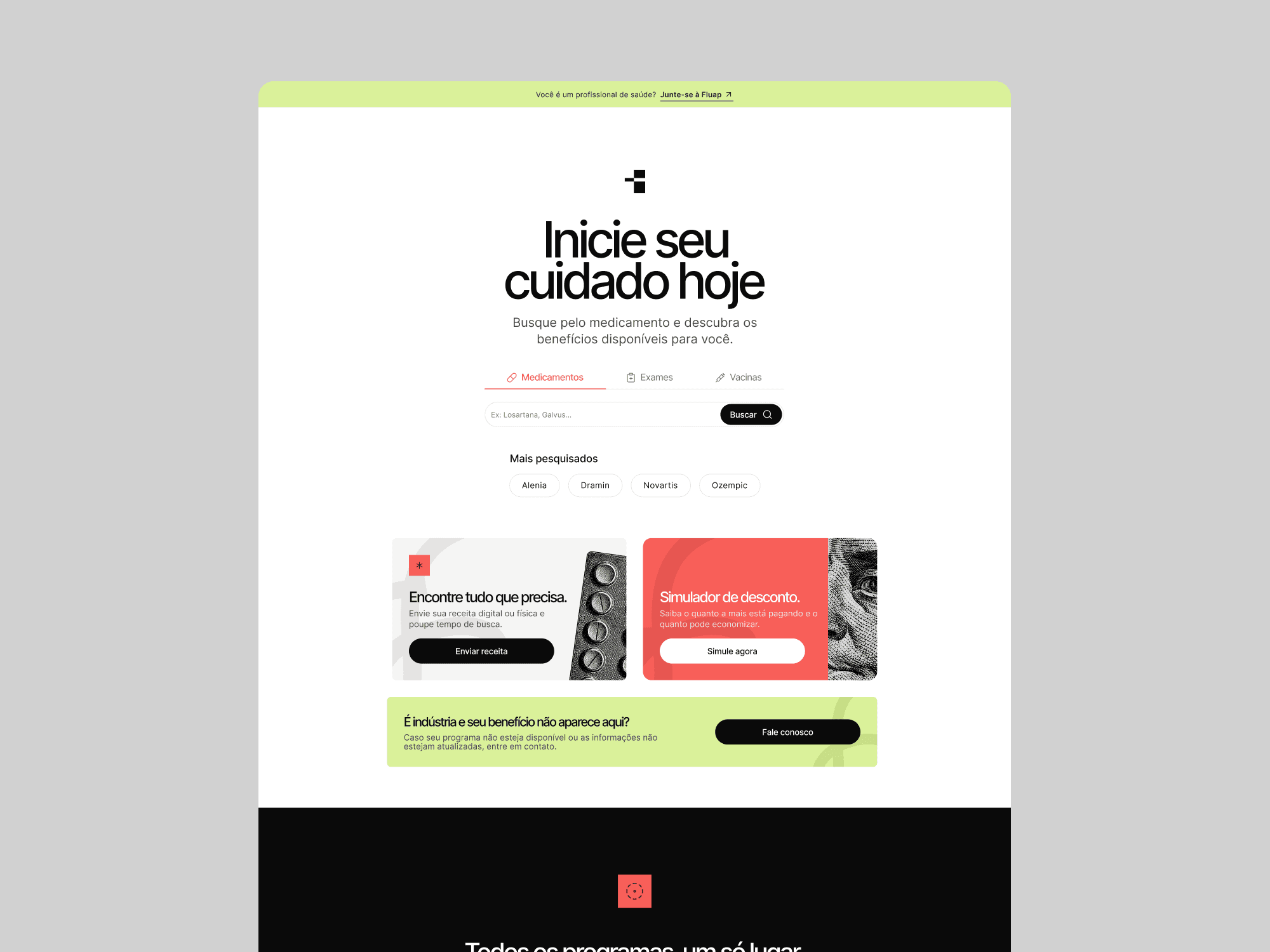 a cellphone leaning against a wall