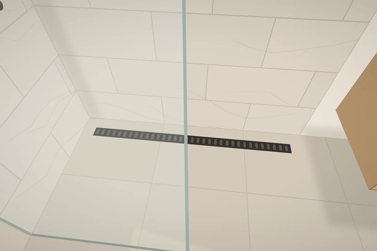 Linear drain along the back of the shower