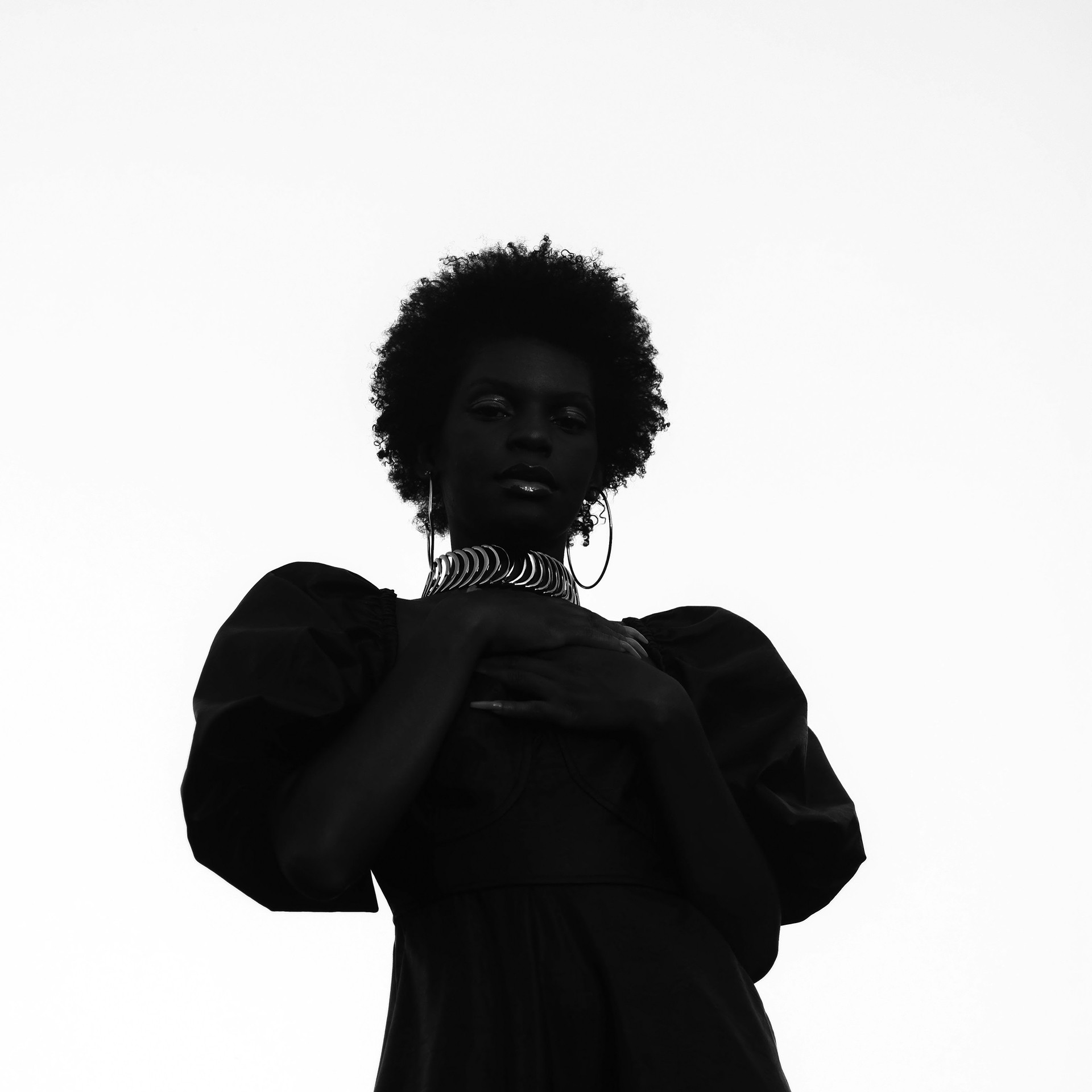 A high contrast image of a woman posing