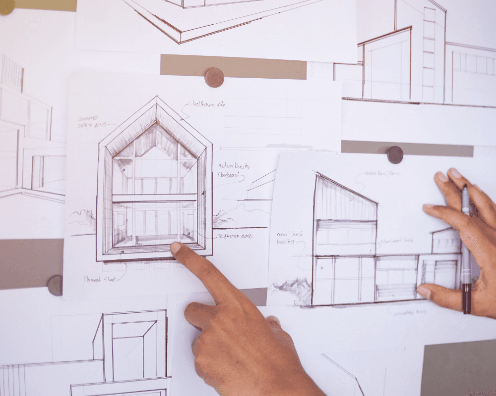 Two men looking at a laptop together