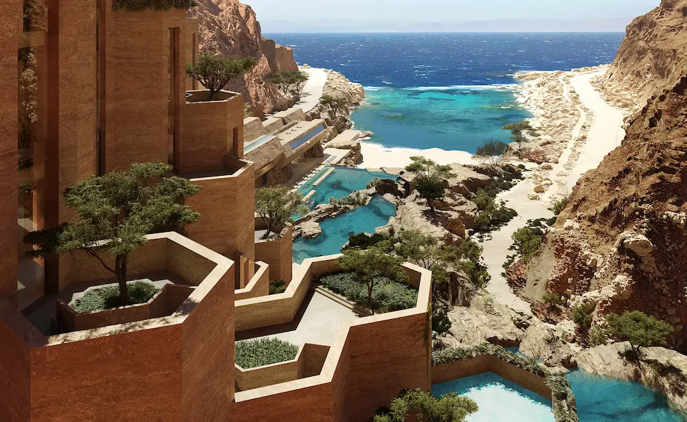 green chairs under umbrellas on shore