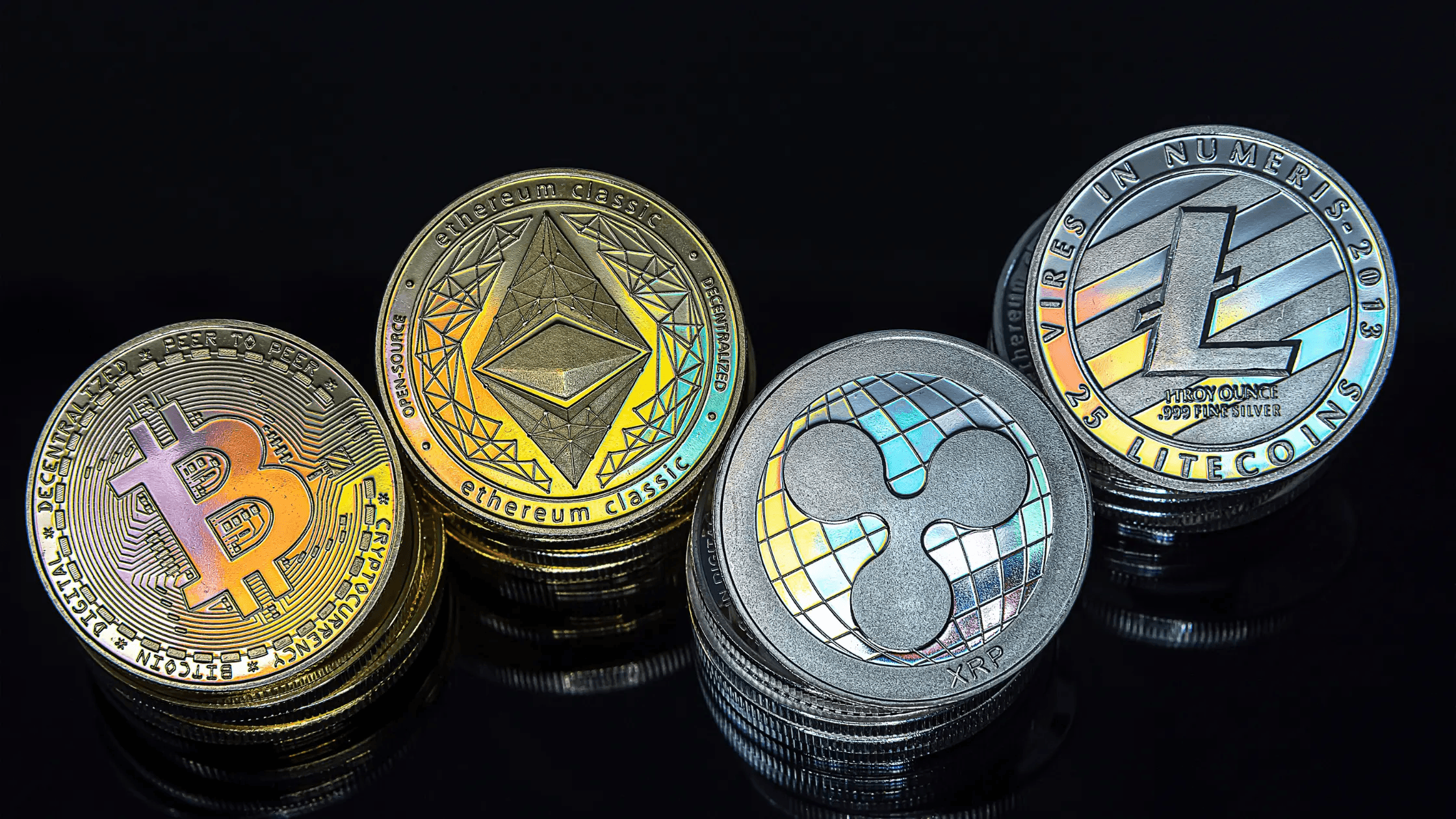 Cryptocurrency coins on black background - Ethereum Tokenomics