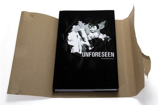unforeseen book unwrapped from its package