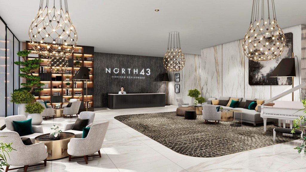 North 43's lobby showcases modern furniture, offering a sophisticated and comfortable environment for visitors.