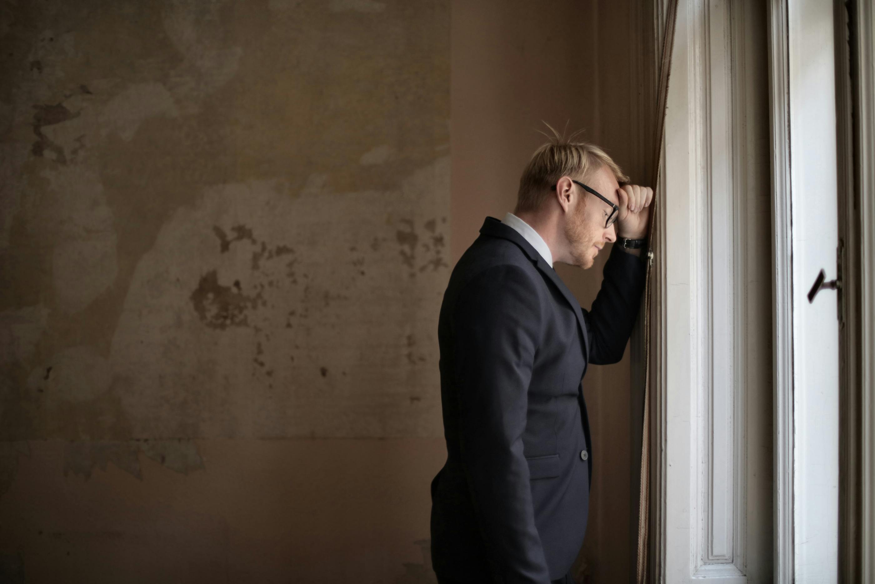 Photo by Andrea Piacquadio: https://www.pexels.com/photo/desperate-evicted-male-entrepreneur-standing-near-window-3771129/