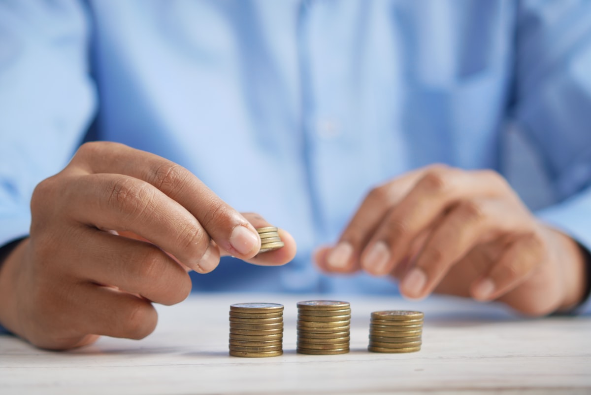 Stacking coins representing website budget planning