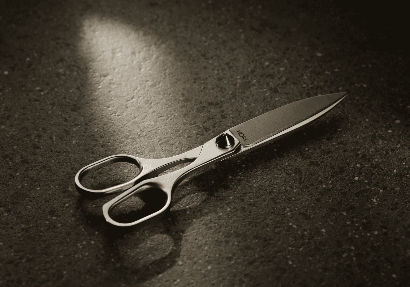 high-quality resharpenable HORL scissors on dark background