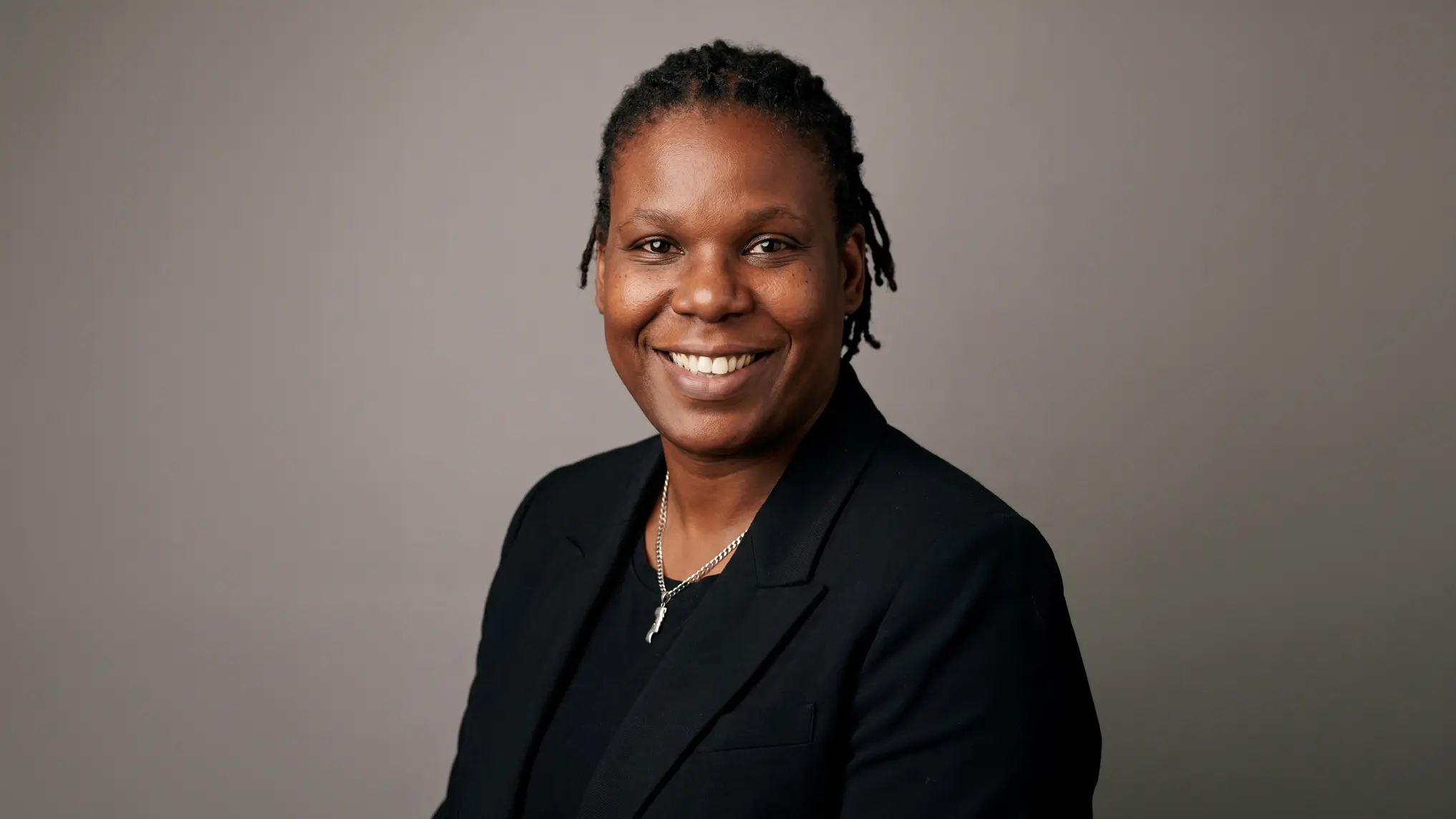 Female barrister in a black suit