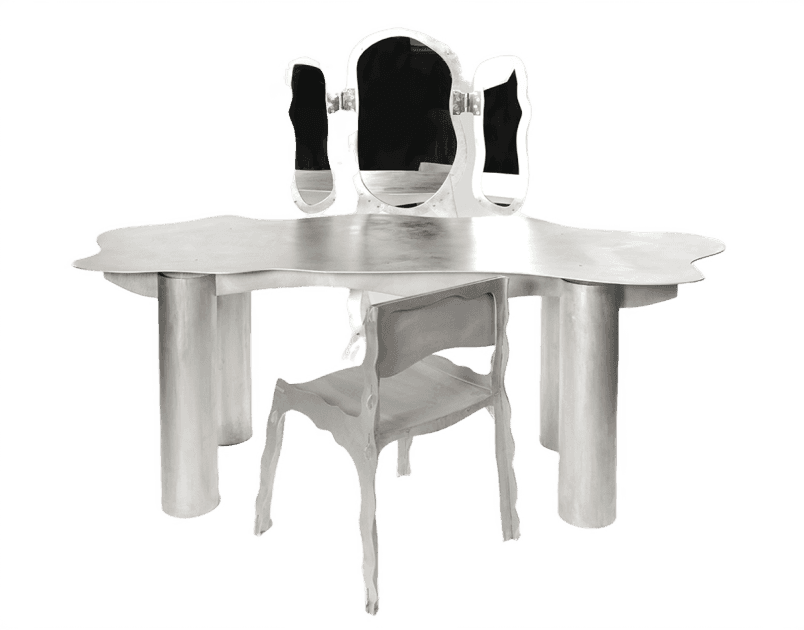 A contemporary, artistic vanity table with an abstract, flowing design features three organically shaped mirrors and a rounded chair, set against a minimalistic background.