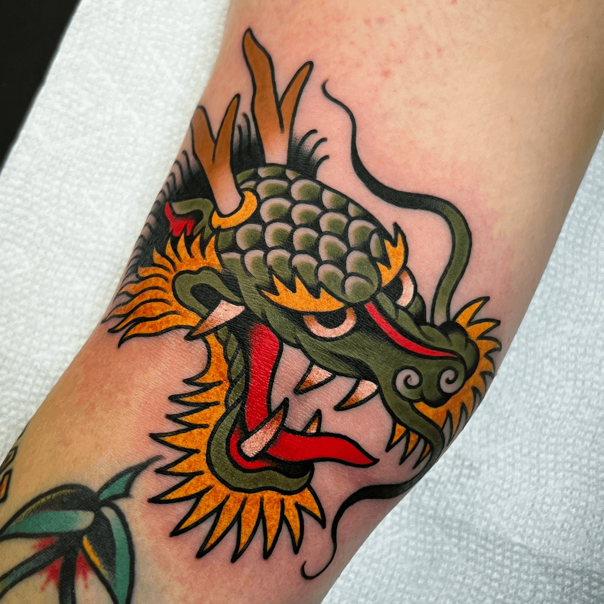 color tattoo of a dragon