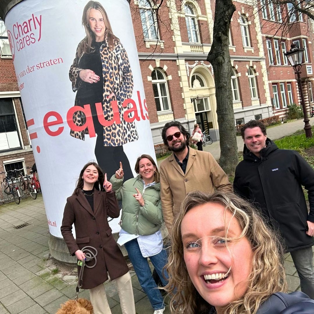 Team Charly Cares at the Charly Equals Role Model Campaign poster