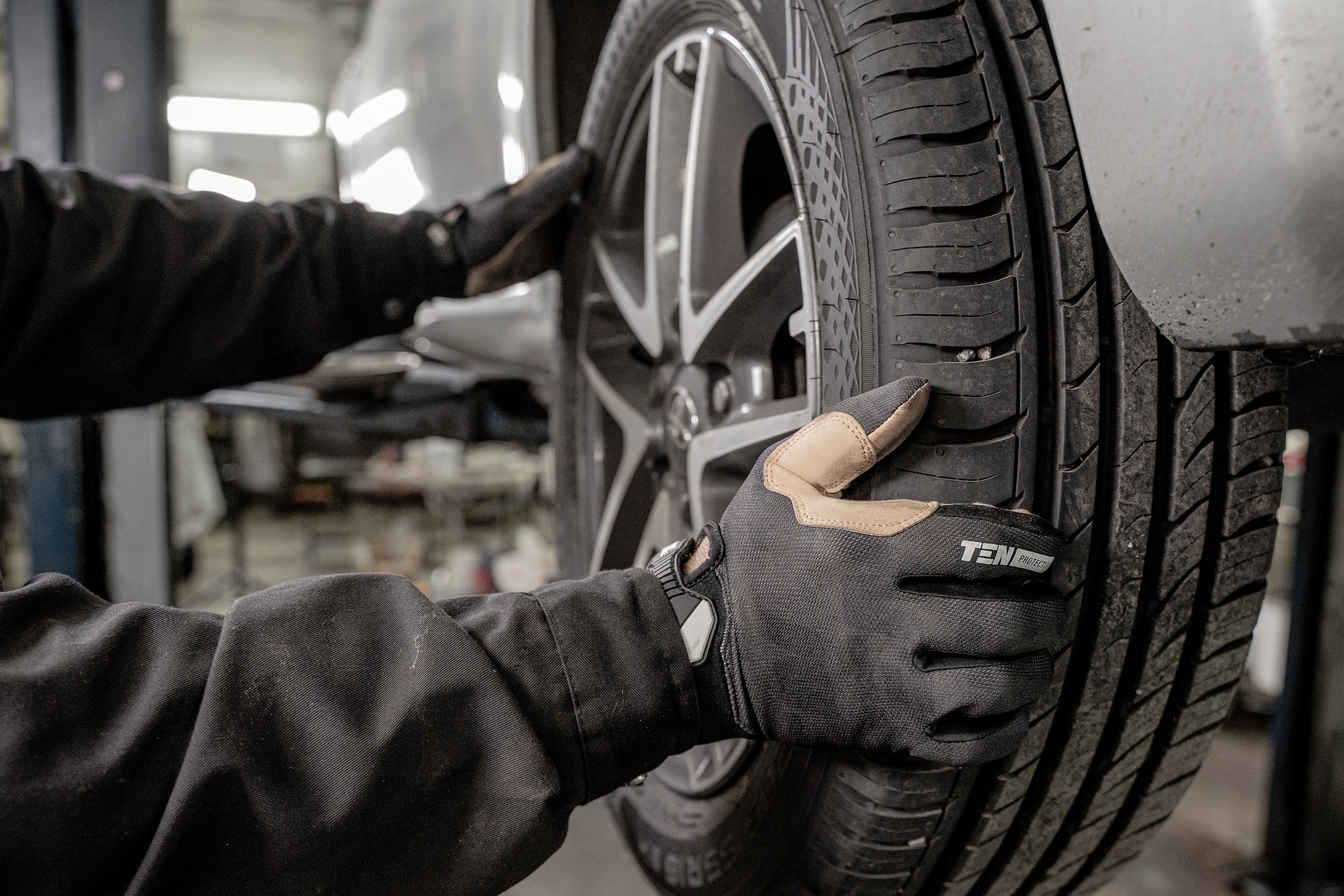 Mechanic Checking below the vehicle