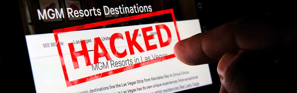 Red digital warning symbol glowing on a circuit board interface, representing active ransomware exploitation of the VMware ESXi CVE 2025 22225 vulnerability and hypervisor compromise.