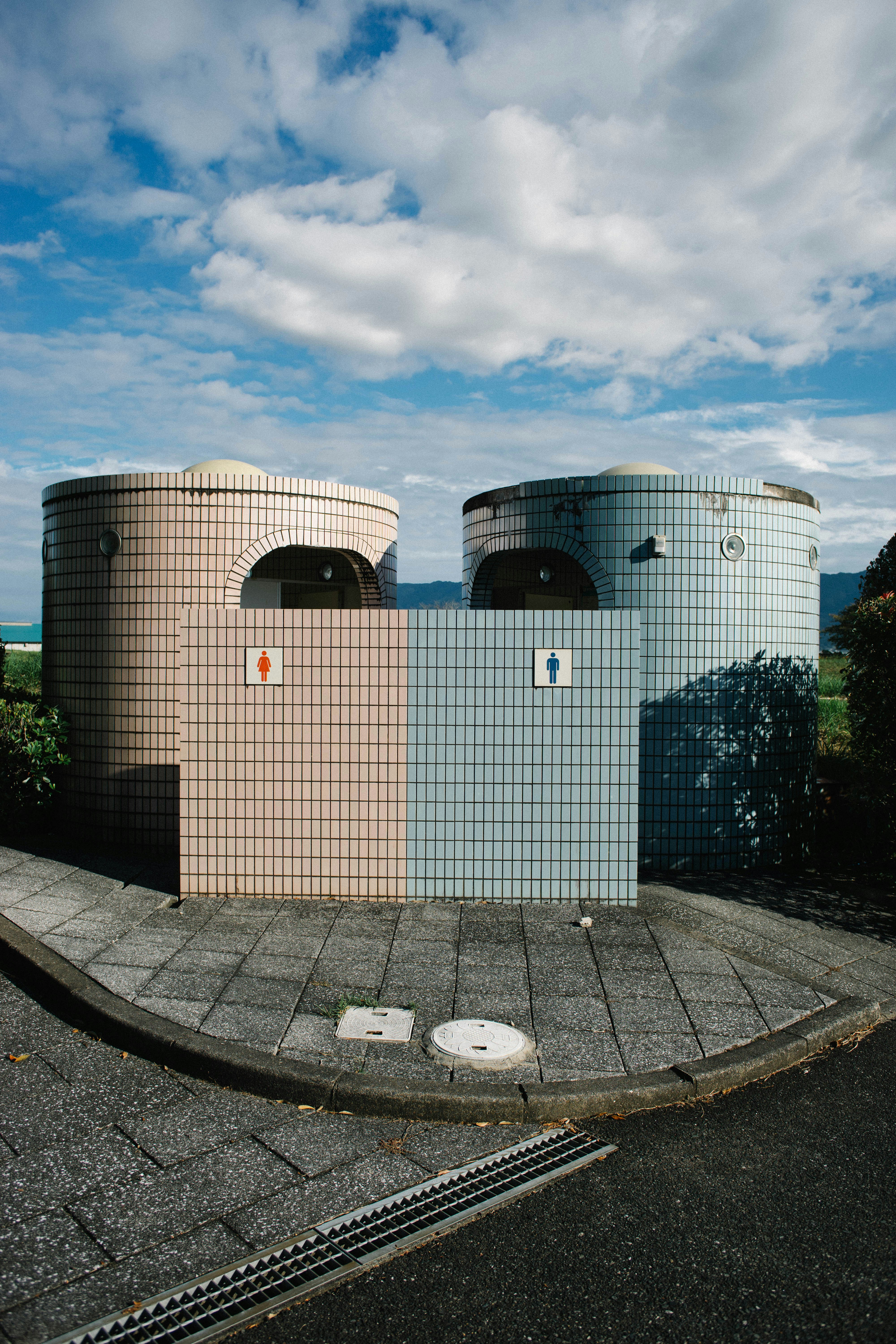 A couple of buildings sitting on the side of a road