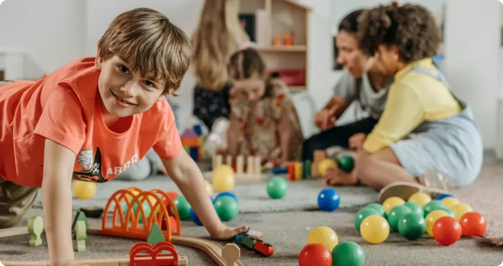 Children playing on the floor of a nursery