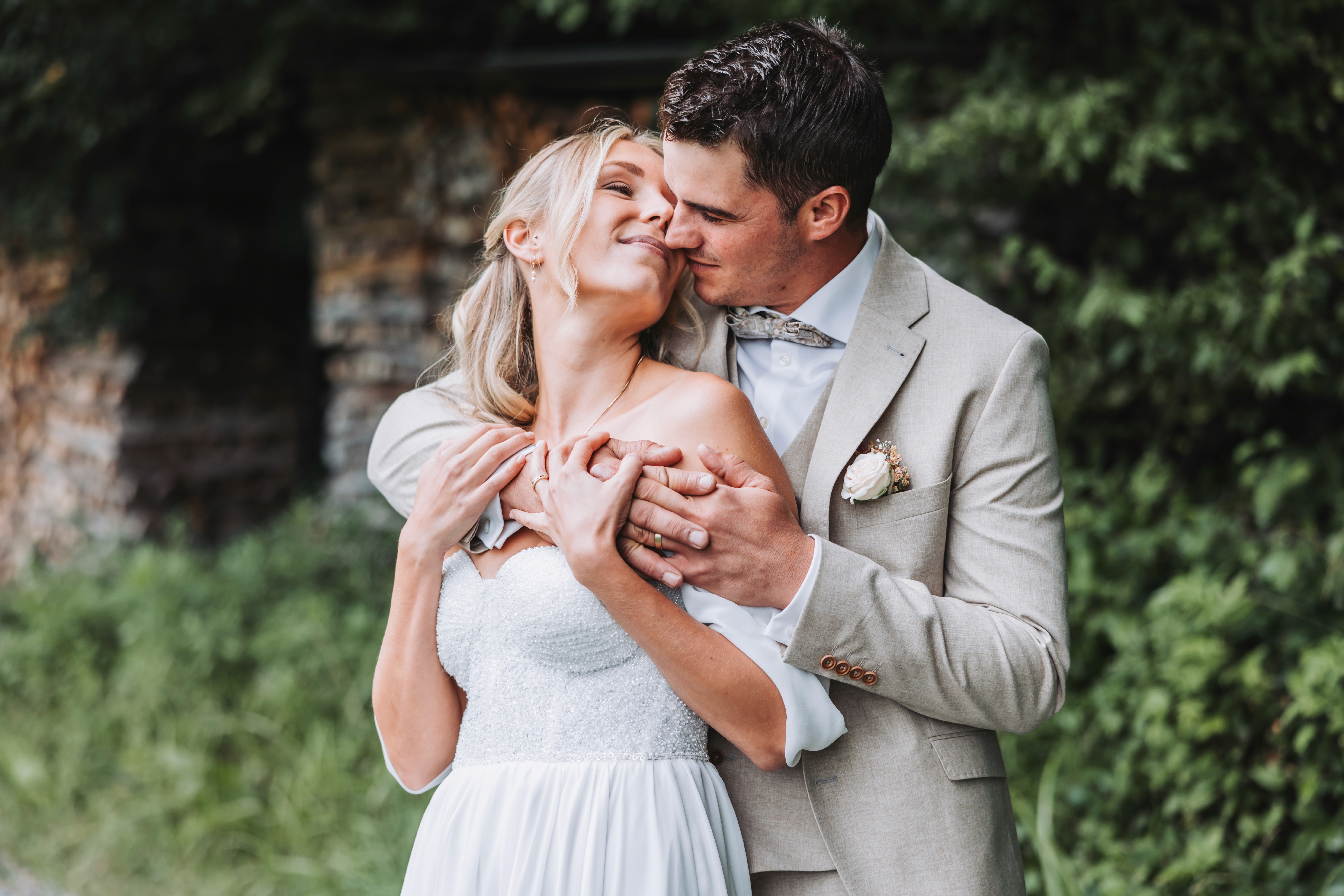 Minimalist floral branch with white flowers and yellow centers casting soft shadows