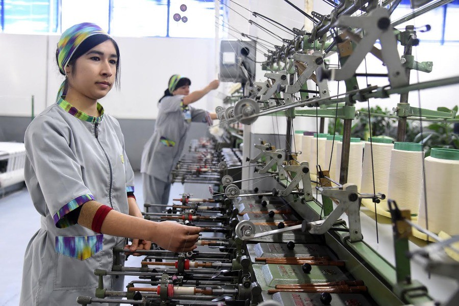 man drawing on dry-erase board