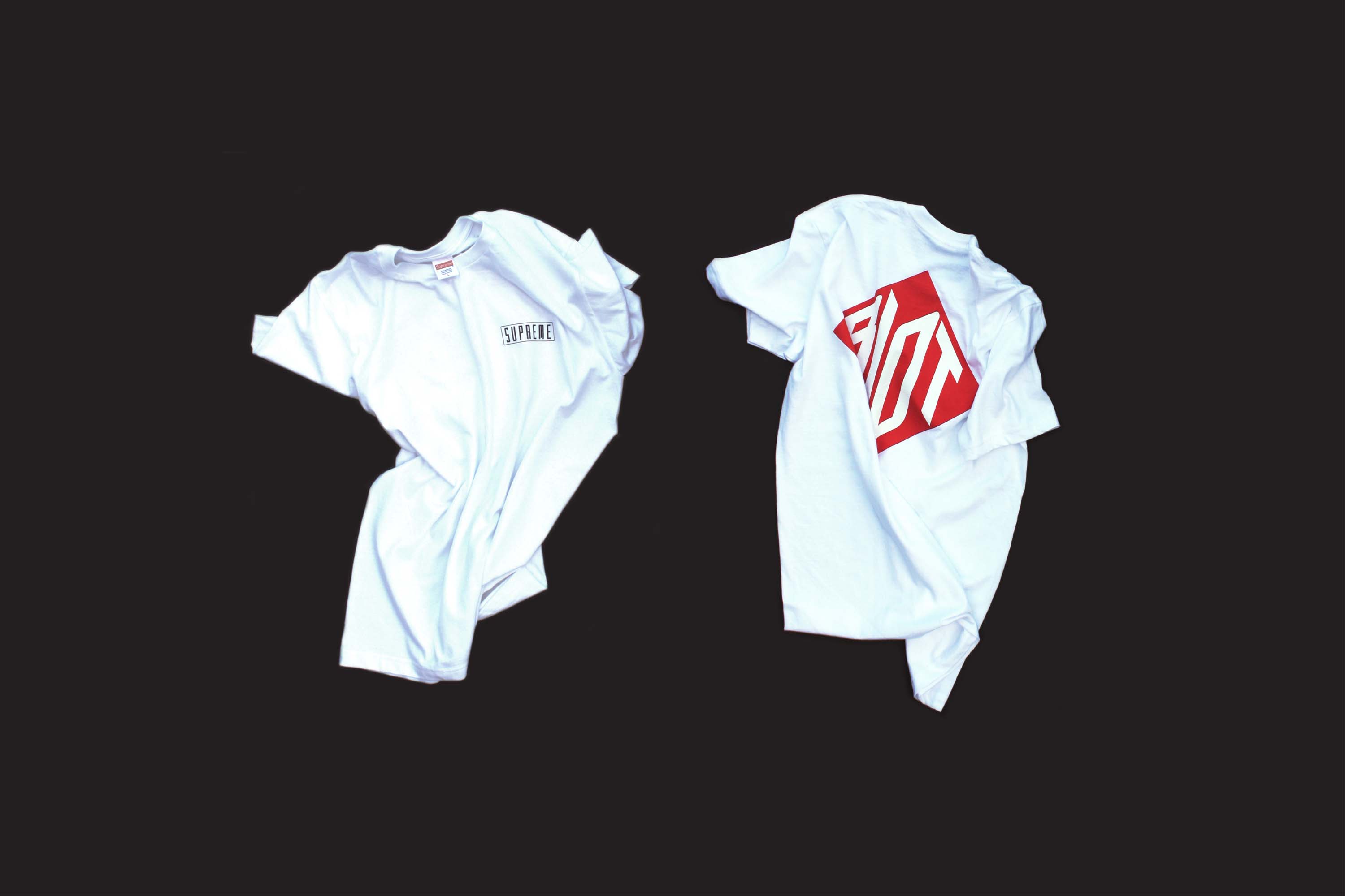 Two white hooded sweatshirts are displayed against a black background, one featuring a red design.