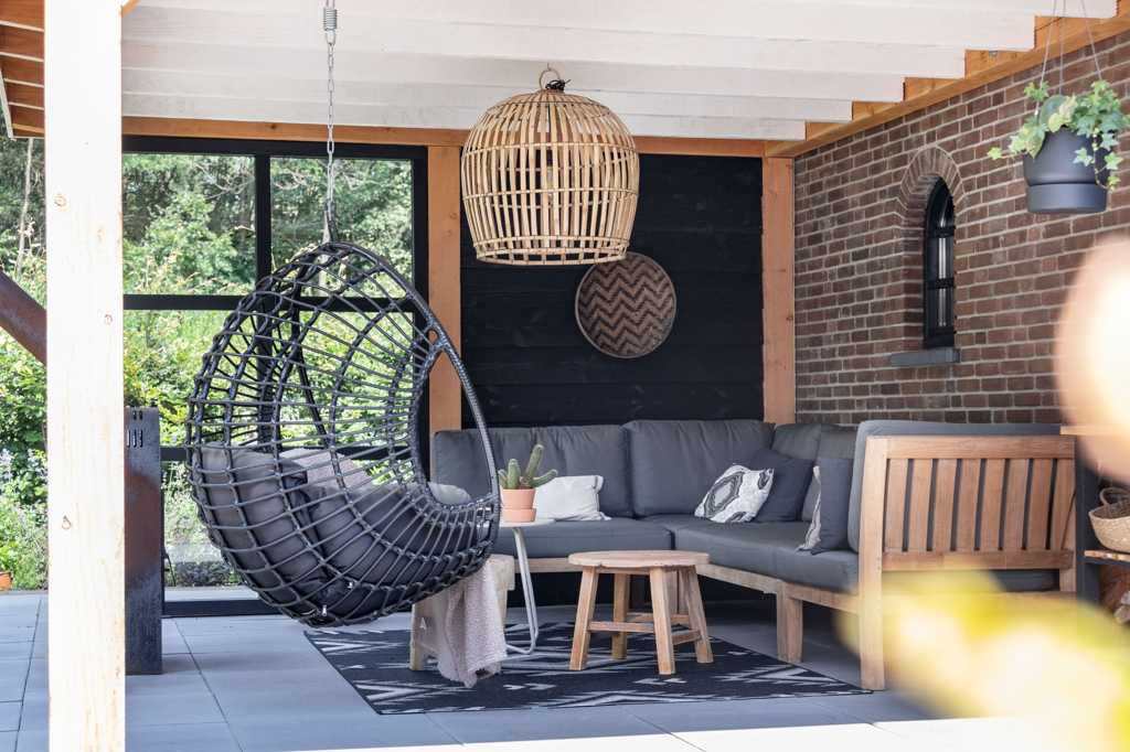 veranda douglas woonboerderij met lounge bank teak