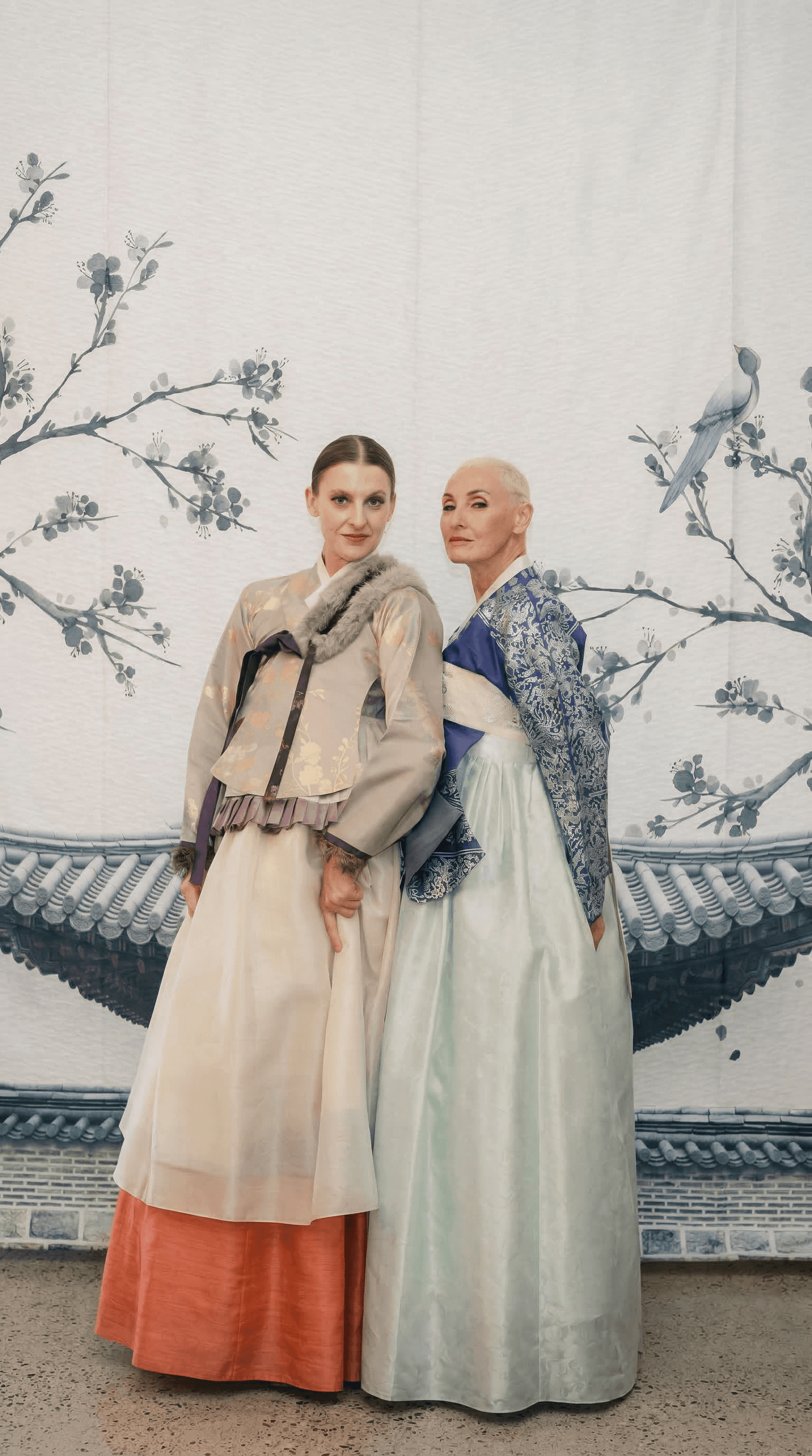 Woman in white breezy shirt.