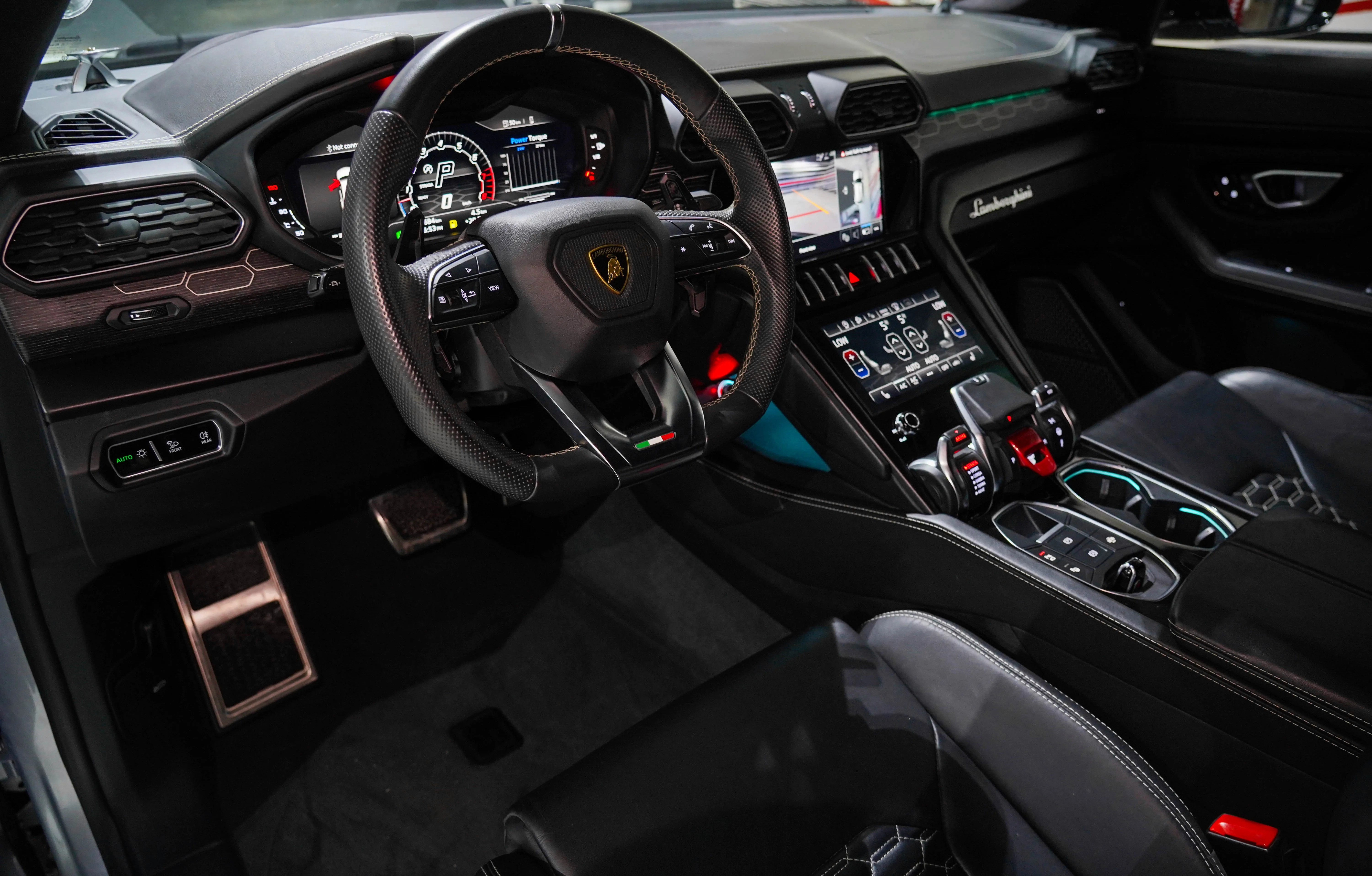 Lamborghini Urus Mansory Style Edition interior with premium leather and sporty cockpit, luxury SUV rental in Dubai
