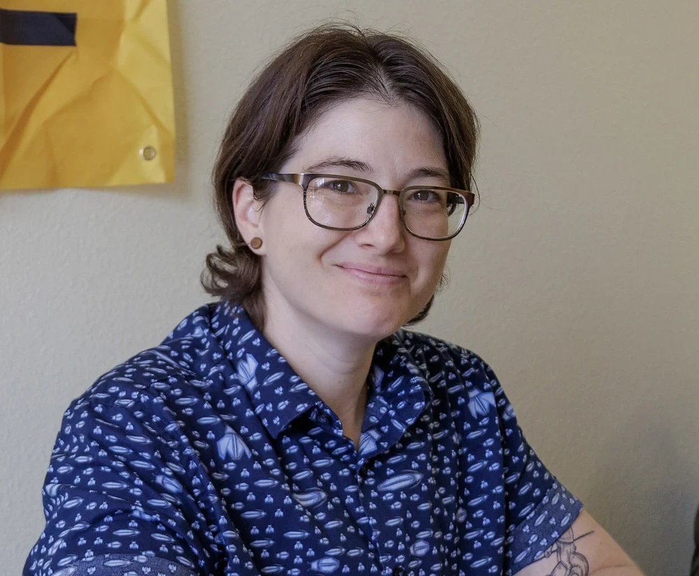 AHA staff member pictured in the report