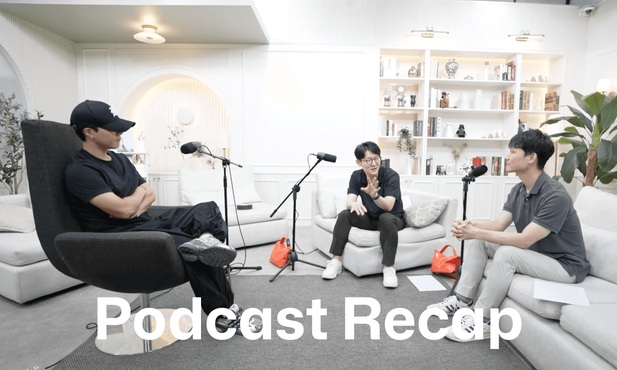 Podcast conversation between two people seated in a living room studio with microphones.