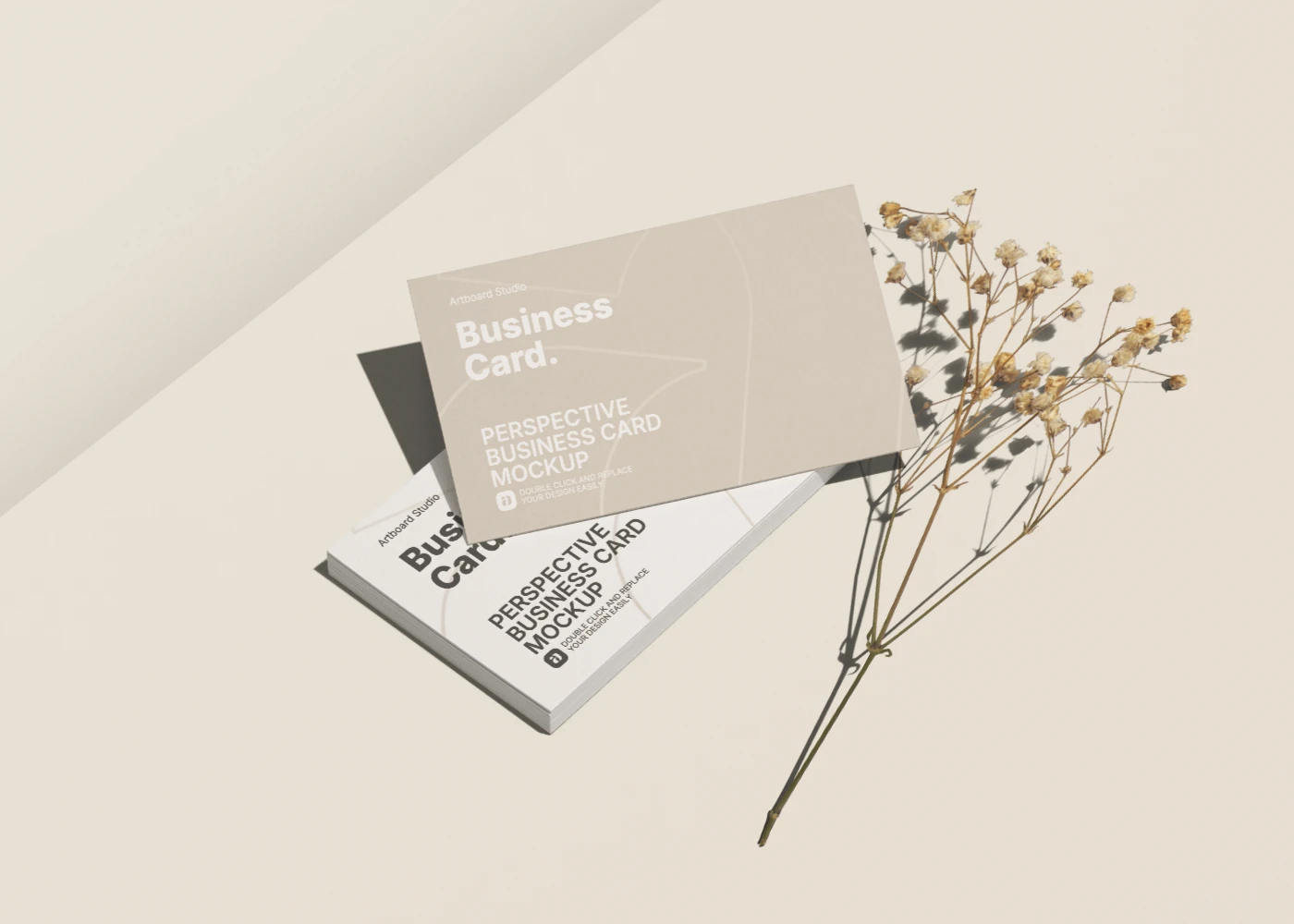 Business card mockup with a stack and decorative item