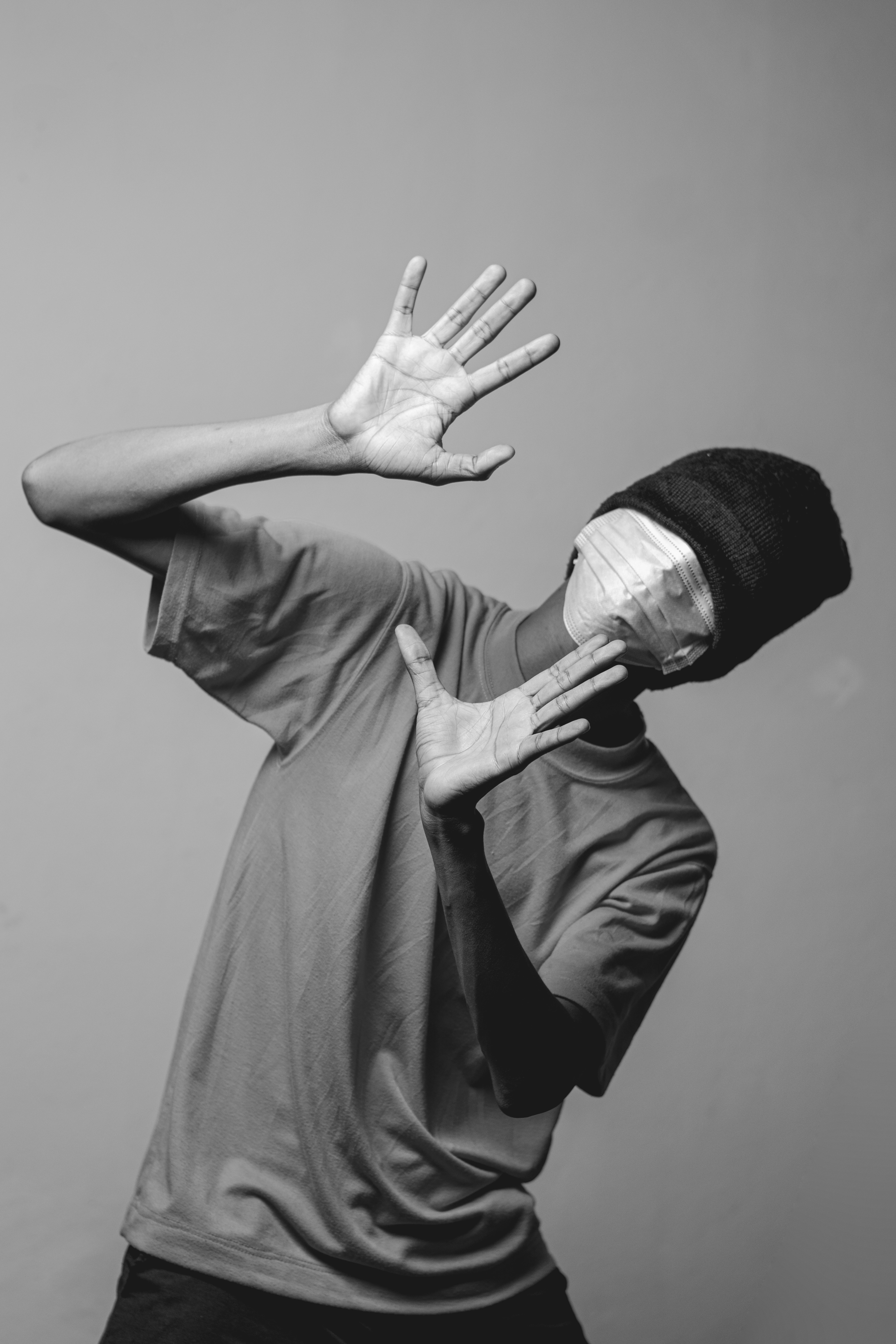 a man with his hands in the air