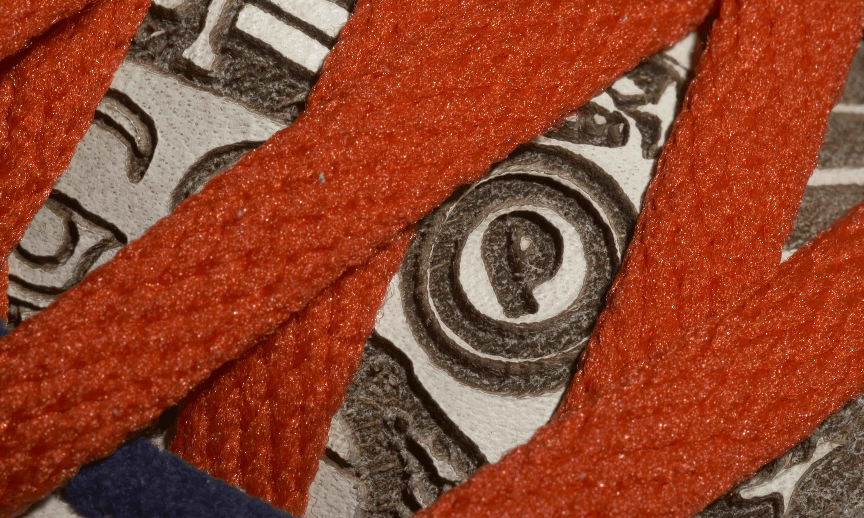 very tight crop, detail of custom lasered nike dunk shoes