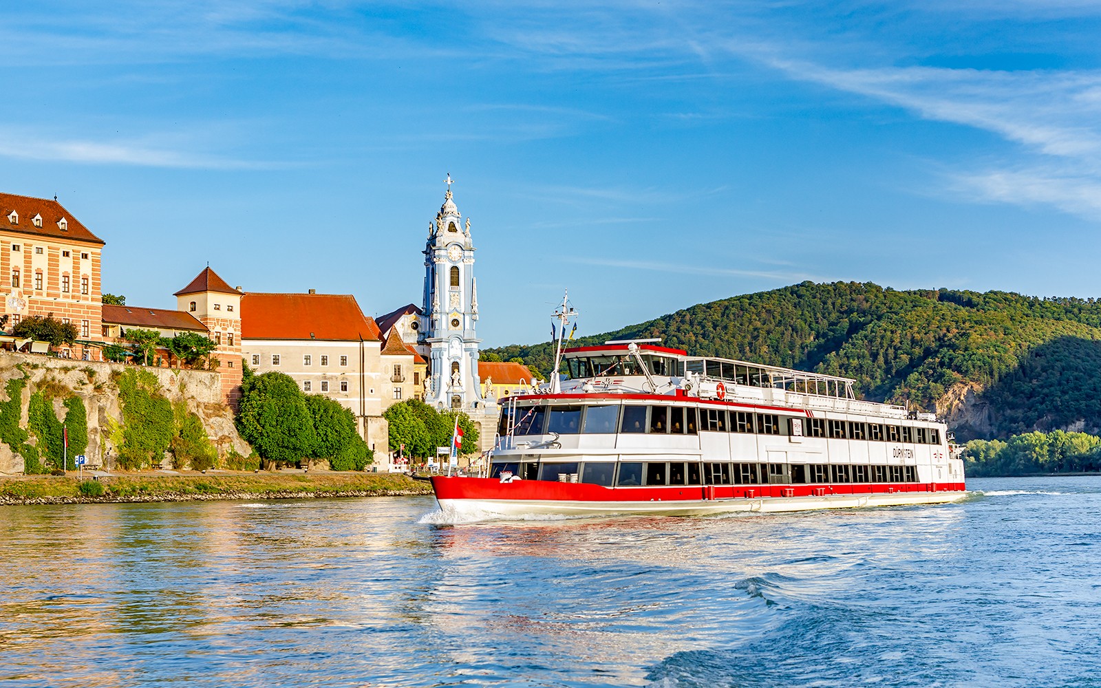 Cruise ship on the Danube River near Dürnstein Abbey, Austria, during a day trip from Vienna.