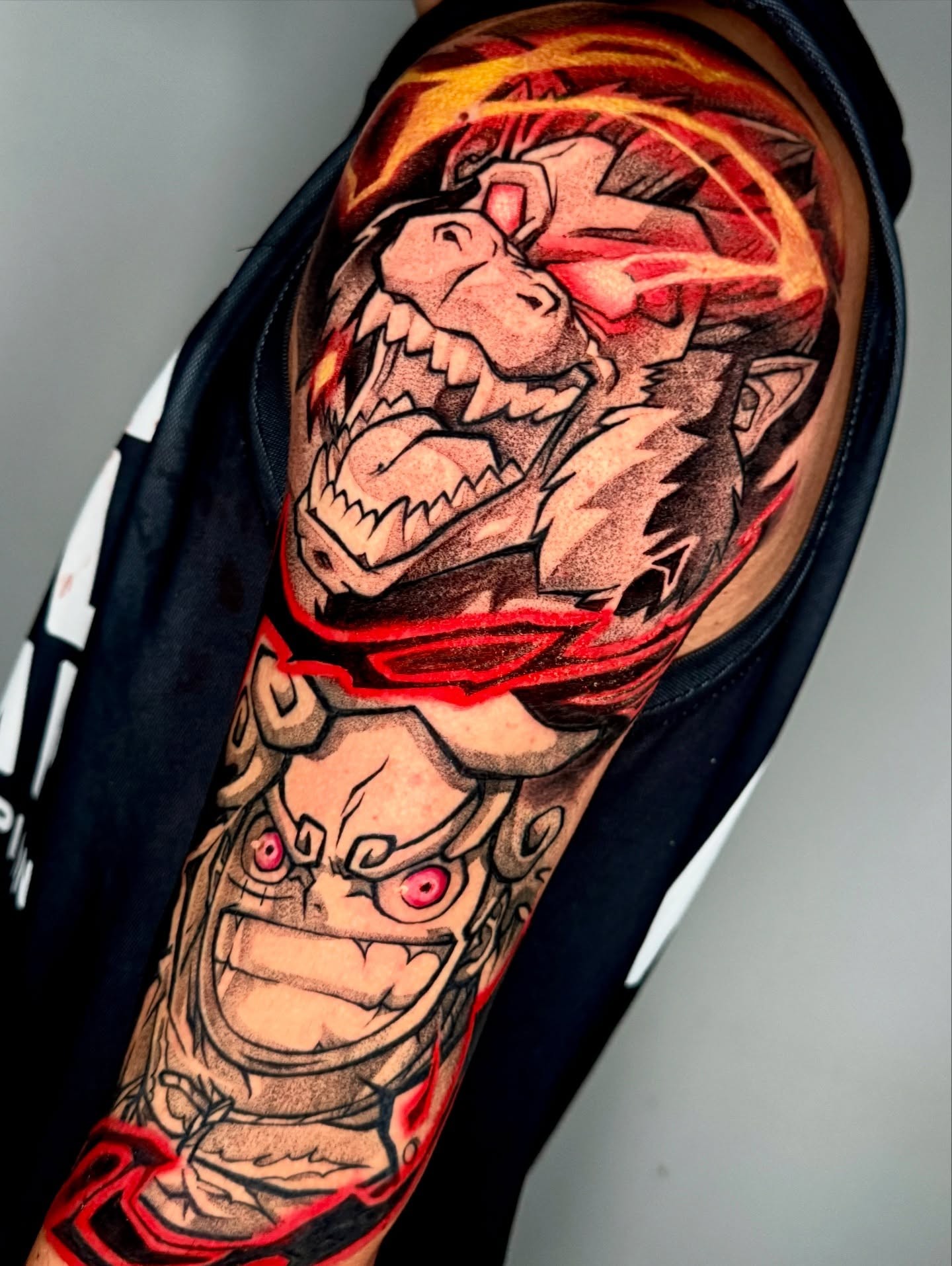 A forearm tattoo of Nezuko Kamado from Demon Slayer, depicted in a stylized anime art style. She is holding a sword.