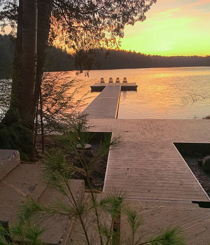 A houston aluminum dock at sunset in haliburton ontario. 