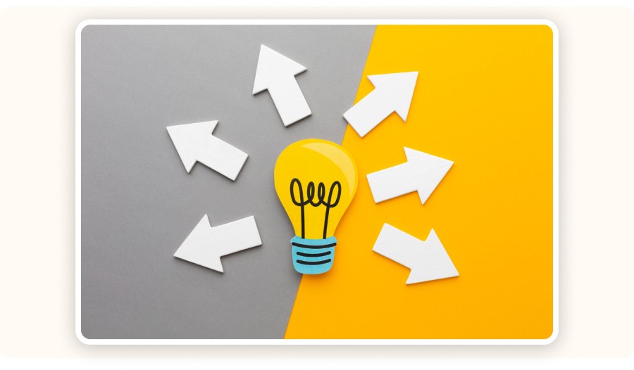Light bulb with arrows pointing outward symbolizing ideas and multiple choices