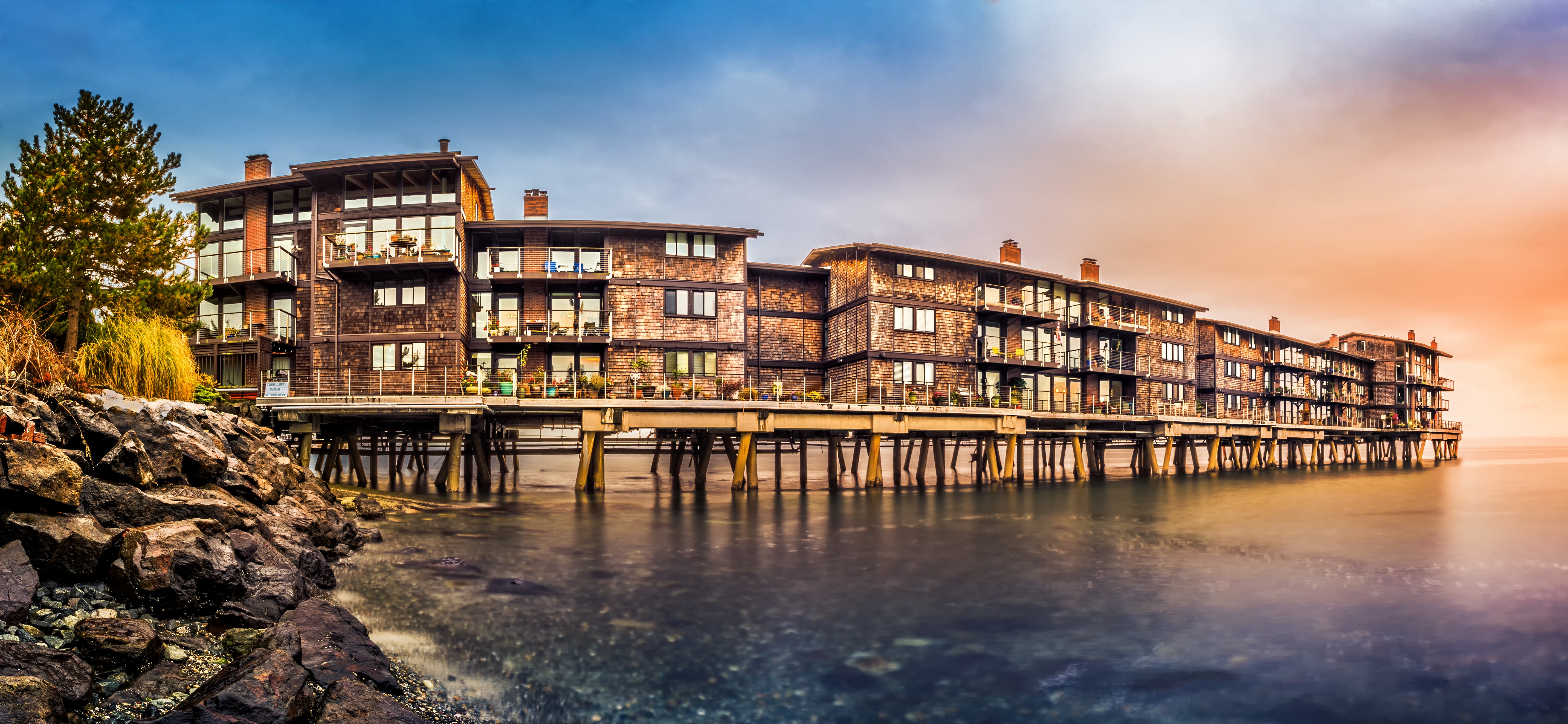 Waterfront condominium community at sunset