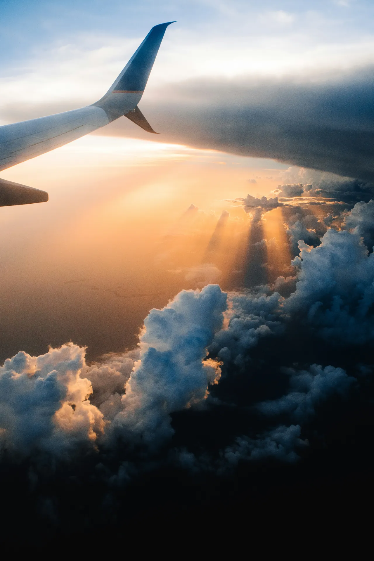 Plane wing in sky