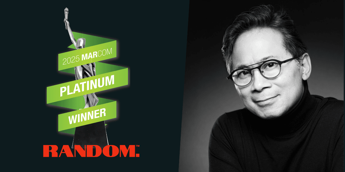 Dr. William Li with 2025 MarCom Platinum Winner trophy for Random's exponential organic social media growth campaign